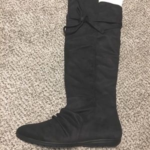 Knee high boots.  Suede.